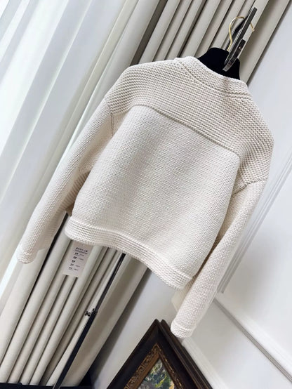 Chanel 25A ecru knitted cardigan