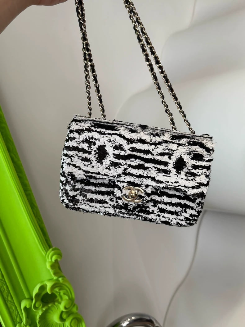 Chanel 24S Mini CF bag in black and white stripes and sequins