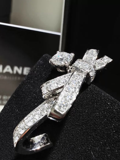 CHANEL earrings, white gold, full diamond bow, c