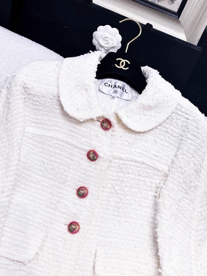 Chanel 17P white tweed jacket with pink lion button