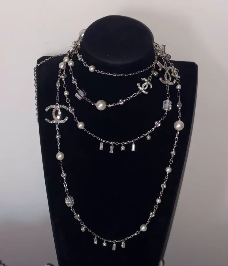 Chanel starry rhinestone encrusted sweater chain