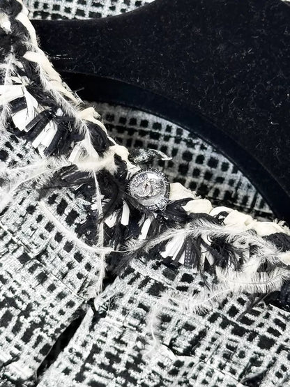 Chanel 2011 black and white tweed & feathers dress