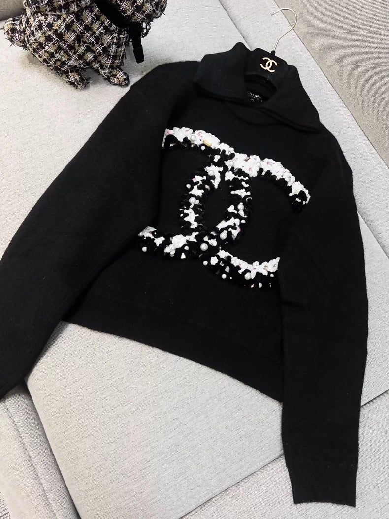Chanel Coco Neige black pearl double C logo lapel cashmere knit