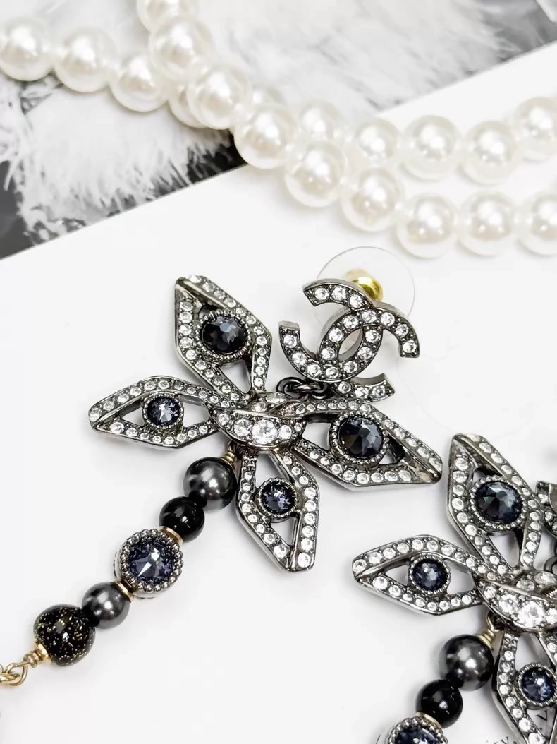 Chanel Métiers d'Art silver butterfly long stud earrings