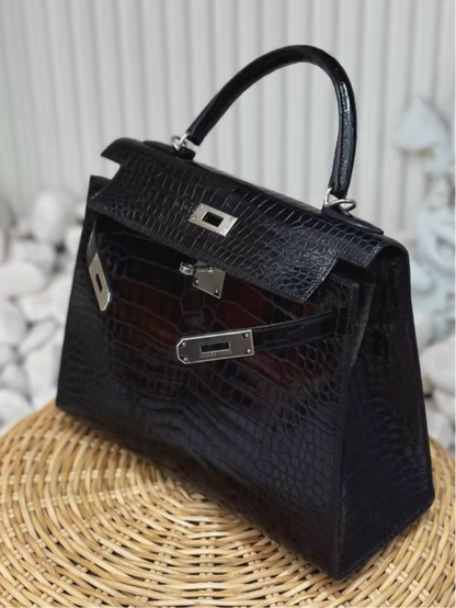 Hermès Kelly 28 black shiny alligator leather palladium hardware