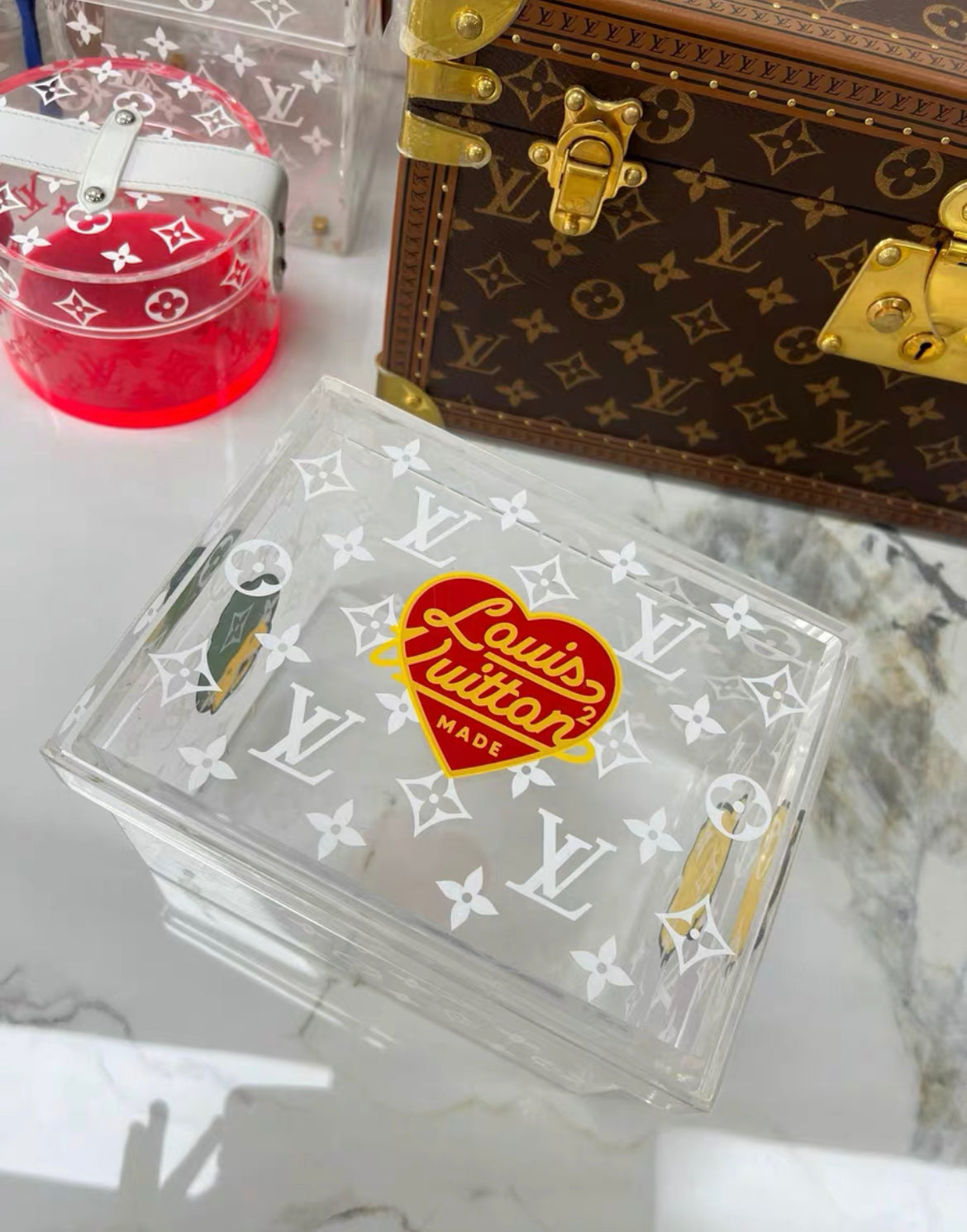 Louis Vuitton Nigo transparent box with duck and tiger characters