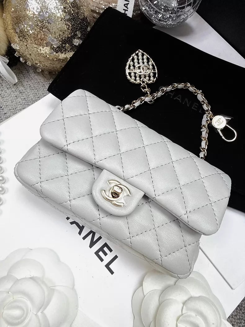 CHANEL 25A CF mini light grey quilted lambskin heart charm bag