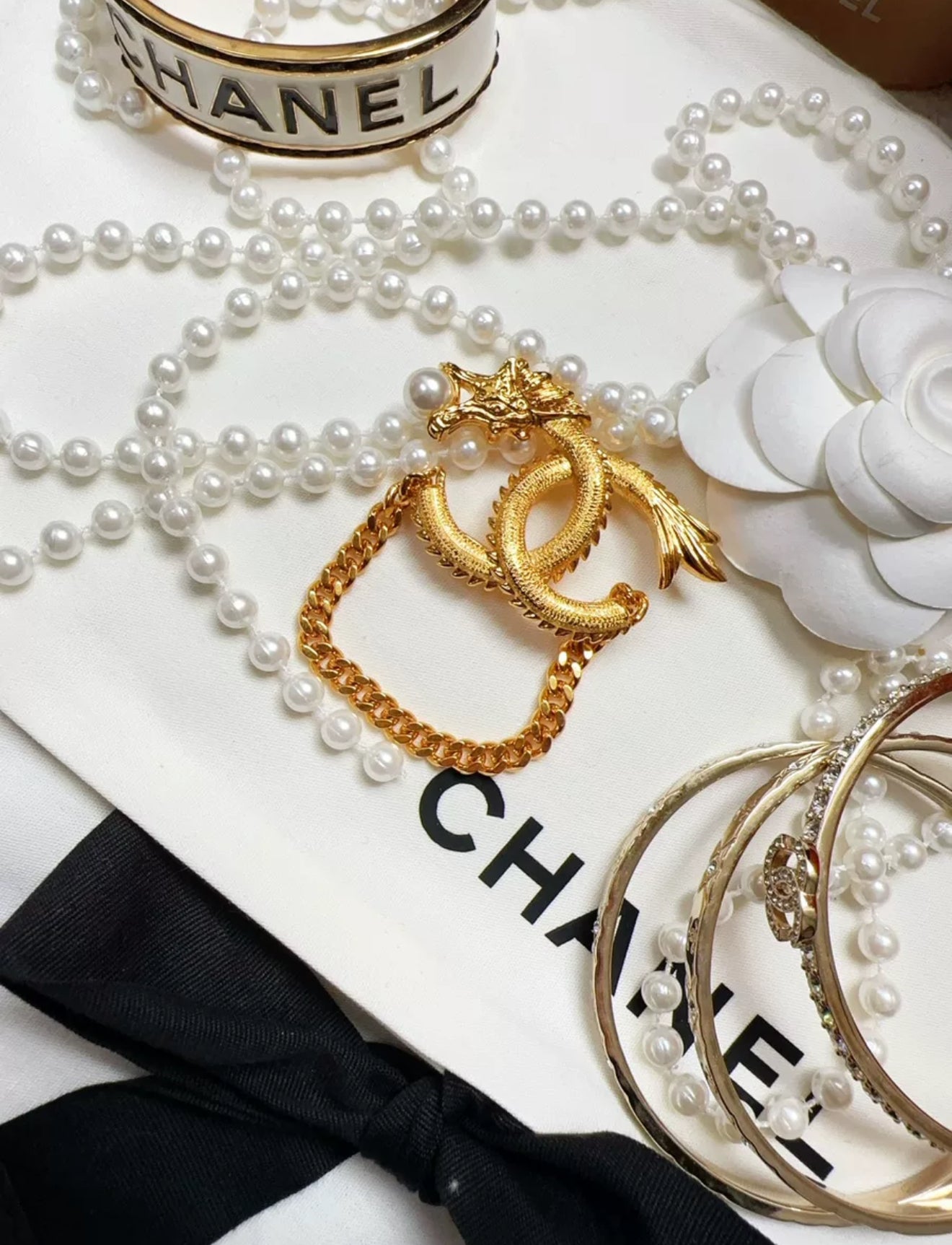Chanel 24 dragon brooch
