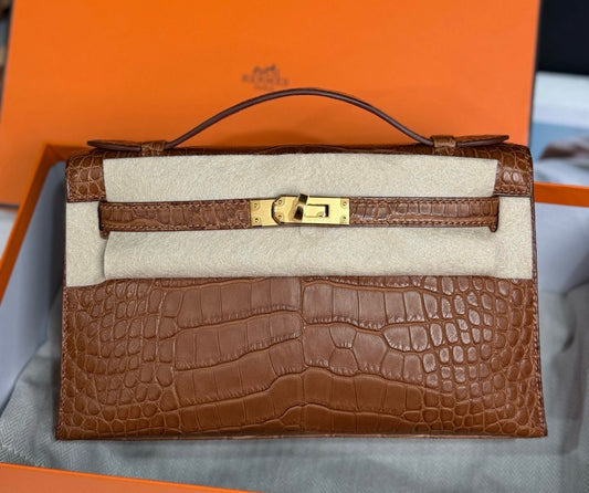 Hermes Kelly Pochette Gold Matte Alligator Leather Gold Hardware