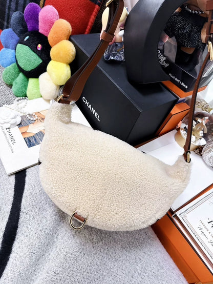 Louis Vuitton beige lamb wool teddy waist bag