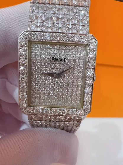 Vintage Piaget men's watch with diamond-set bezel and bracelet, quartz movement