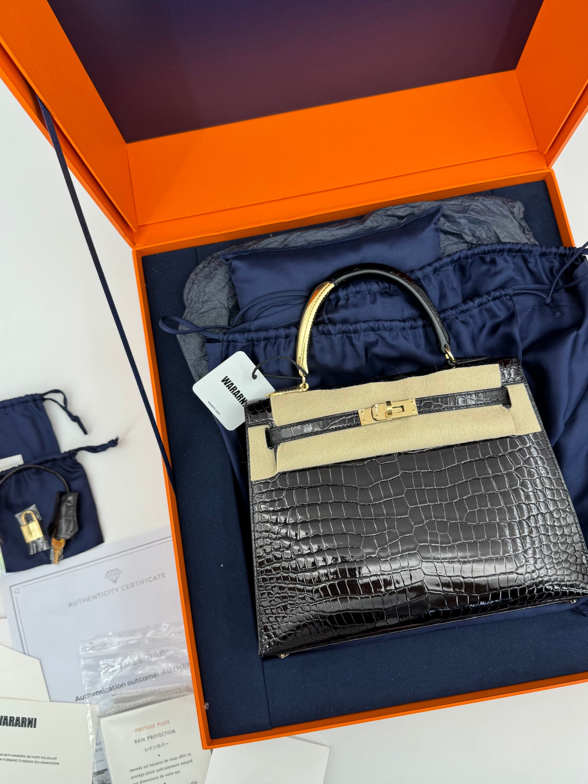 Hermès Kelly 25 Midas shiny crocodile handbag with gold hardware – authenticated collector’s piece