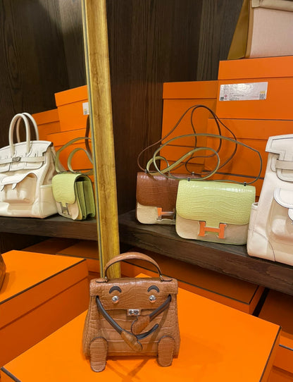 Hermès Matte Gold Alligator and Ebene Swift Quelle Idole Kelly Doll Palladium Hardware