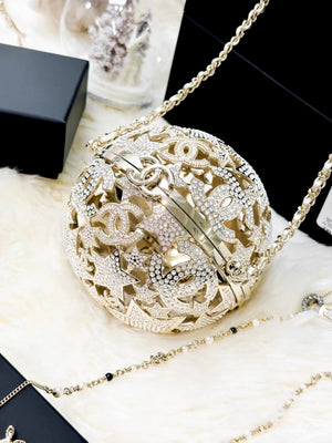 Chanel 25A gold star-patterned spherical evening bag