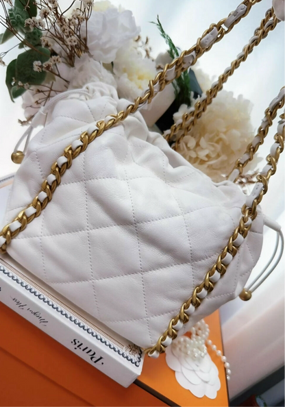 Chanel 22P ecru leather gold chain bucket bag