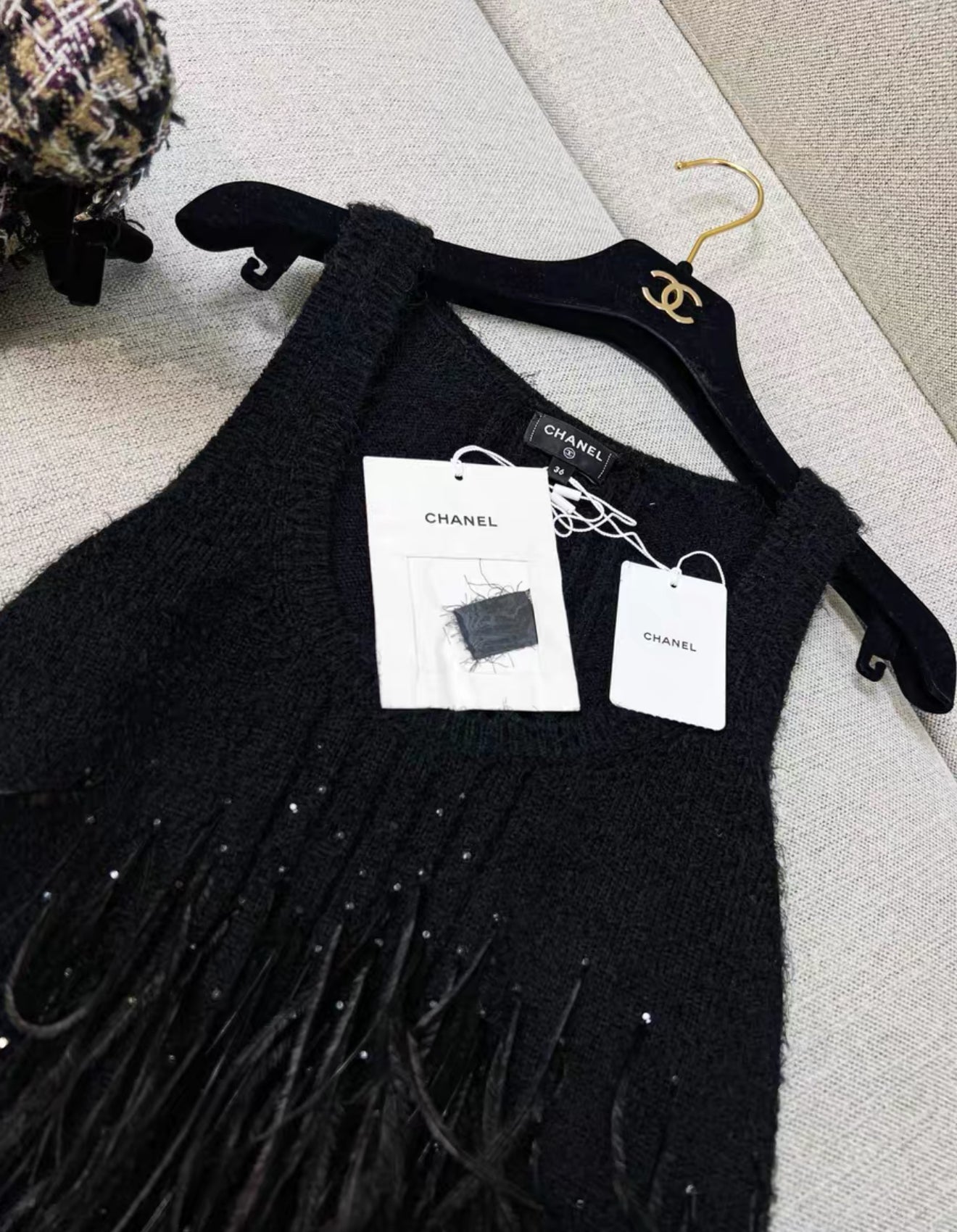 Chanel 25S black feather top