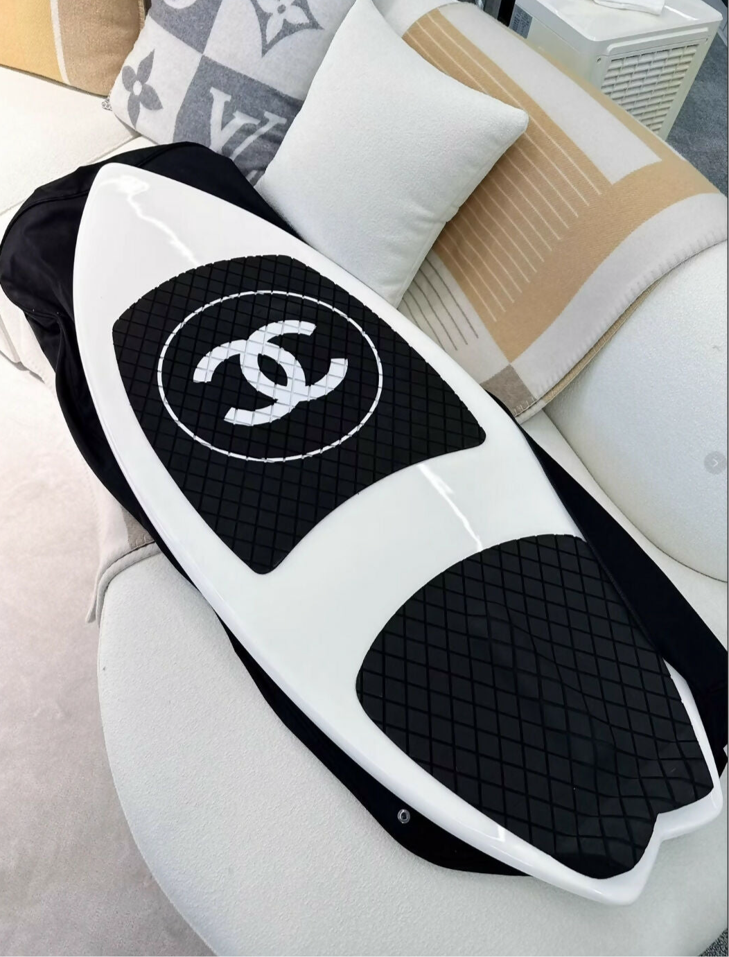 Chanel white surfboard