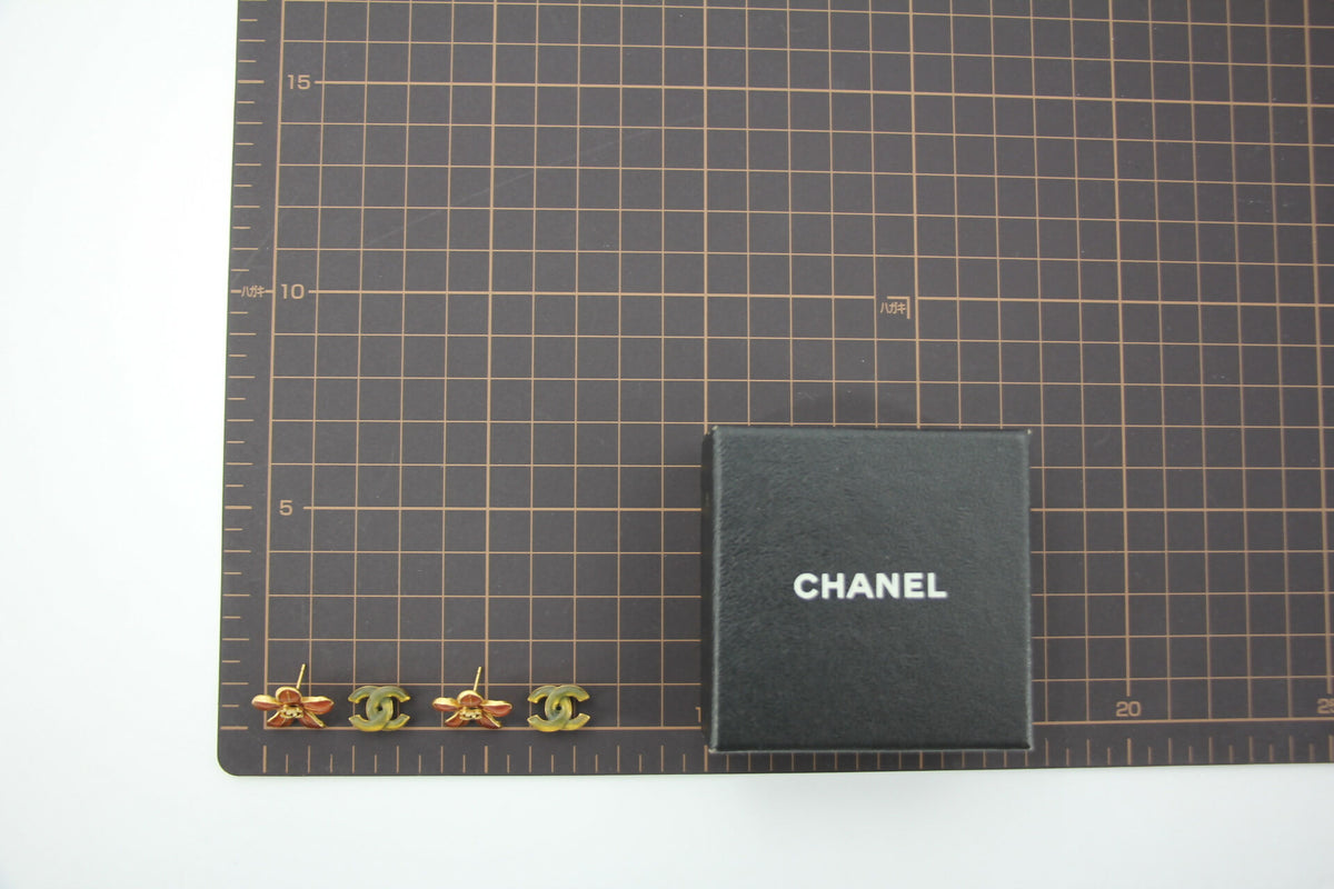 Chanel 03P Enamel Orange Five-Petal Flower Green CC Stacked Earrings