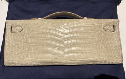 Hermes Kelly cut Unchained Beton Matte Porosus White Gold hardware