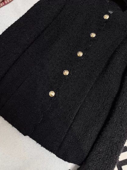 Chanel 20k black tweed jacket