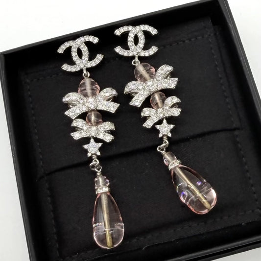 Chanel pink crystal diamond bow earrings