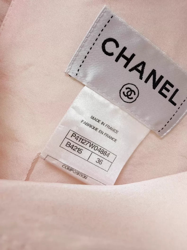 Chanel pink dress with a black tulle lining