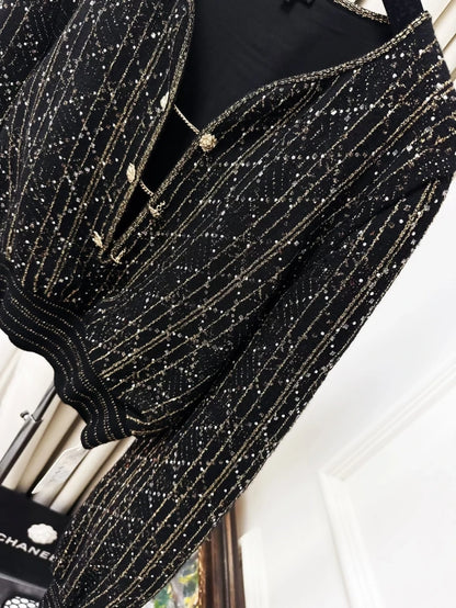 Chanel 20A gold quilted black knit top