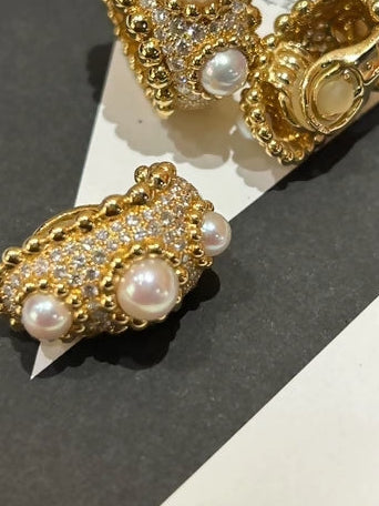 Chanel high-jewelry gold clip-on earrings + ring