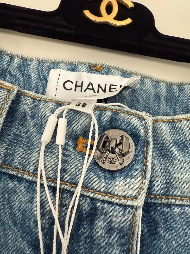 Chanel 25k bow blue denim jeans
