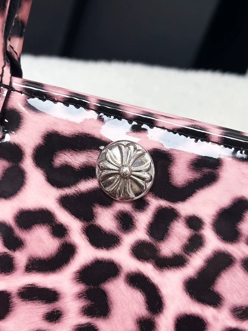 Chrome Hearts mini handbag in pink patent leather with leopard