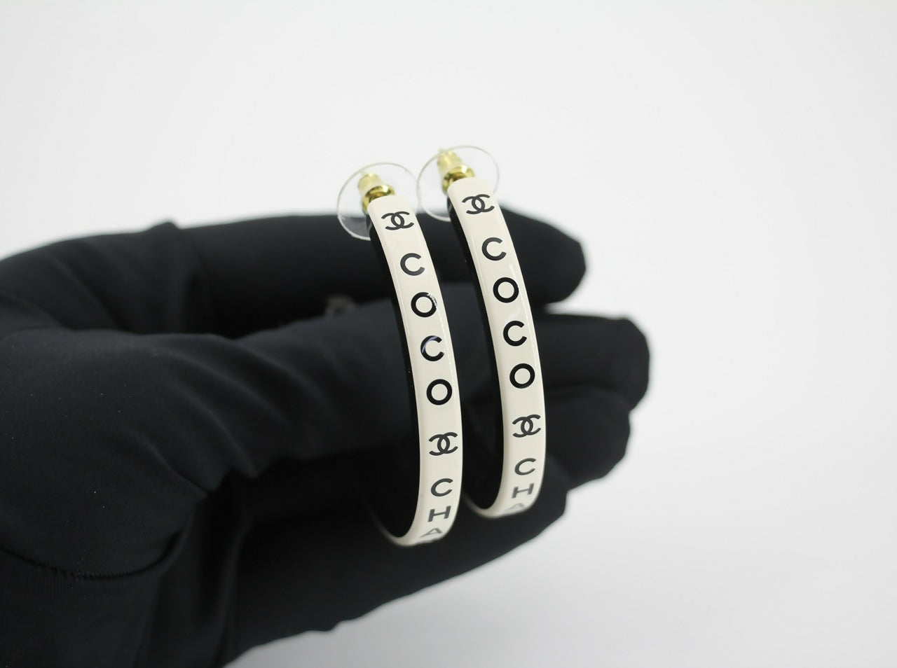 Chanel B22S Resin White Curved COCO Motif Hoop Stud Earrings