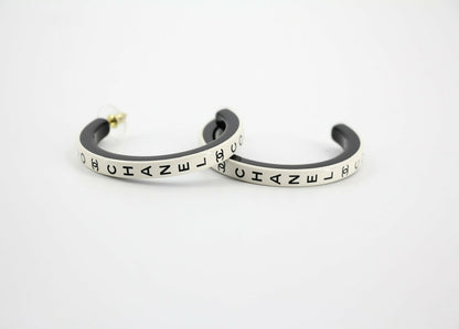 Chanel B22S Resin White Curved COCO Motif Hoop Stud Earrings