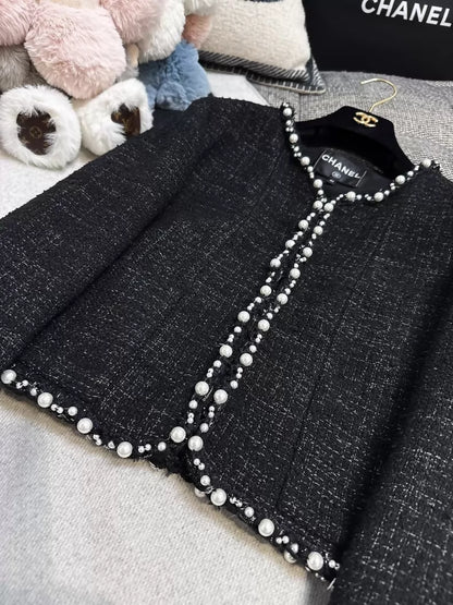 Chanel 25P black pearl-trimmed tweed jacket