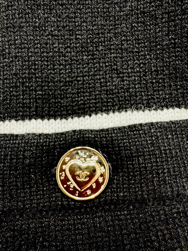Chanel 25B black knit cardigan with white collar