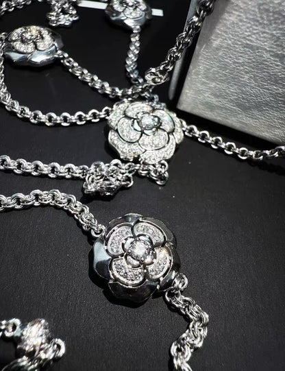 Chanel high jewellery 10 camellia flowers in 18k white gold and diamonds