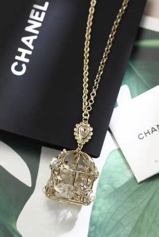 Chanel 22k birdcage necklace