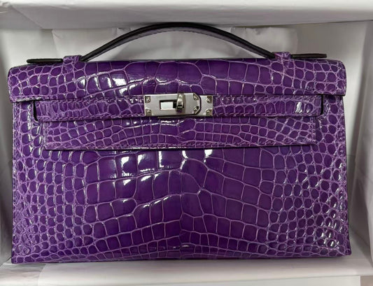 Hermes Kelly Pochette ultraviolet shiny alligator palladium hardware