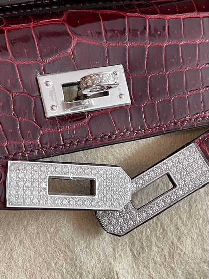 Hermès Kelly Cut Bourgogne Shiny Porosus Diamond Hardware