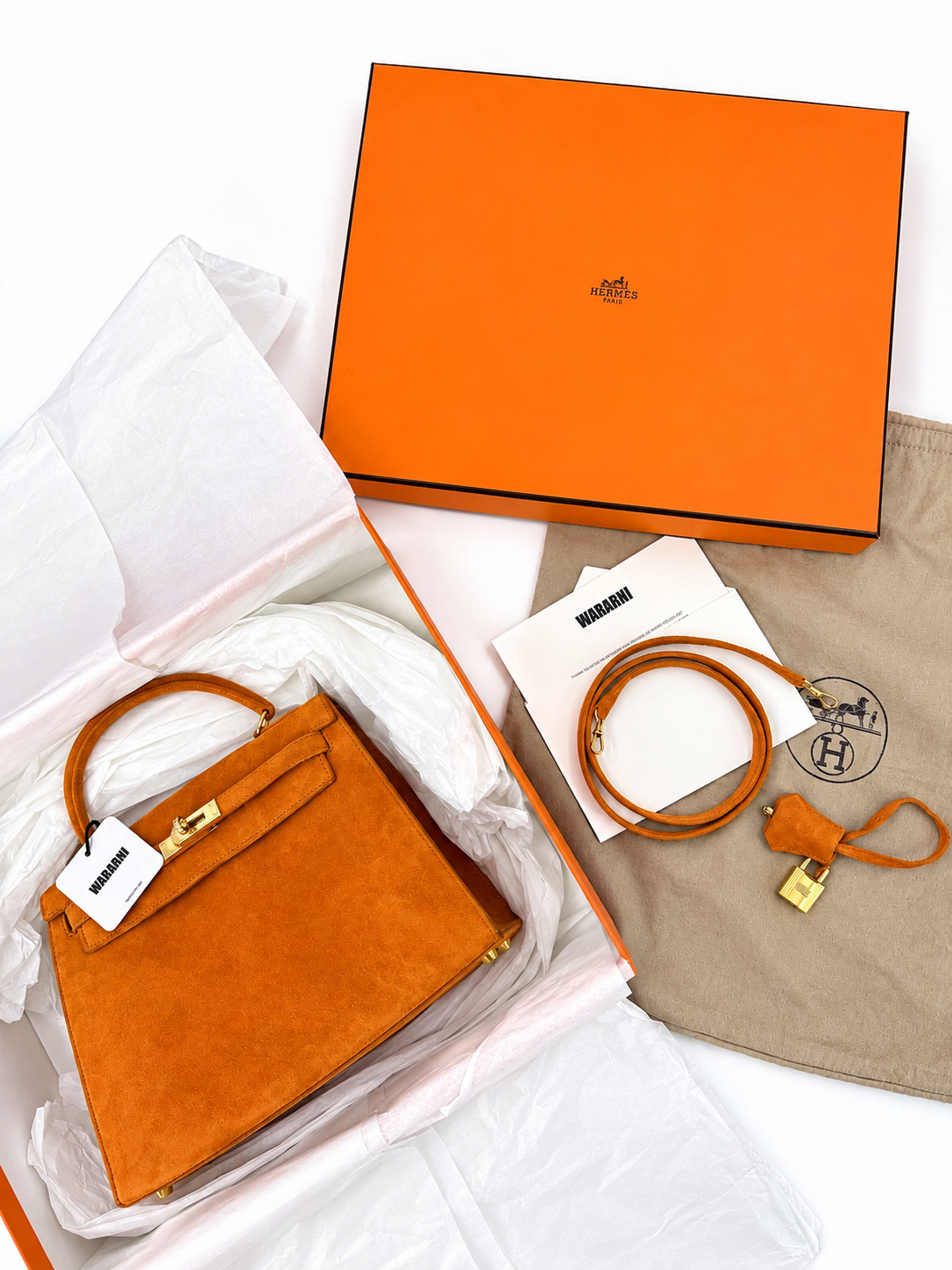 Hermès Kelly 25 Orange Doblis suede leather gold diamond hardware