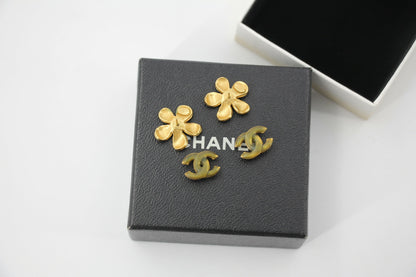 Chanel 03P Enamel Orange Five-Petal Flower Green CC Stacked Earrings