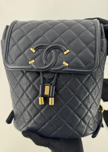 Chanel Dark Blue leather backpack with gold hardware
