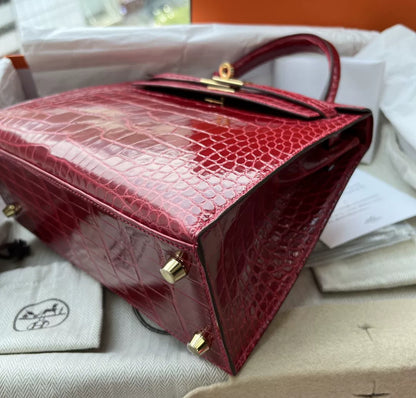 Hermès Kelly 25 red shiny crocodile leather gold hardware