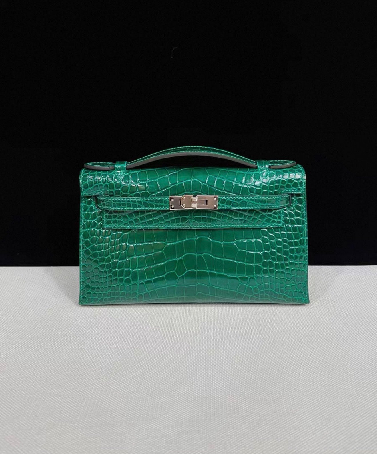 Hermes Kelly Pochette Green Emerald Shiny Crocodile Leather Palladium Hardware