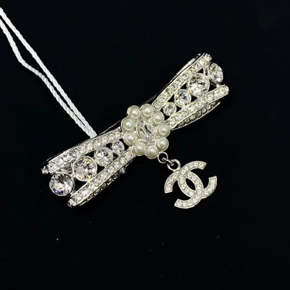 Chanel 23a brooch bow adorned with Swarovski crystals