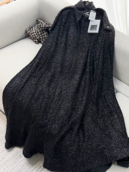 Chanel, black iridescent extra-long cape from the Chanel 2018 Snow Collection
