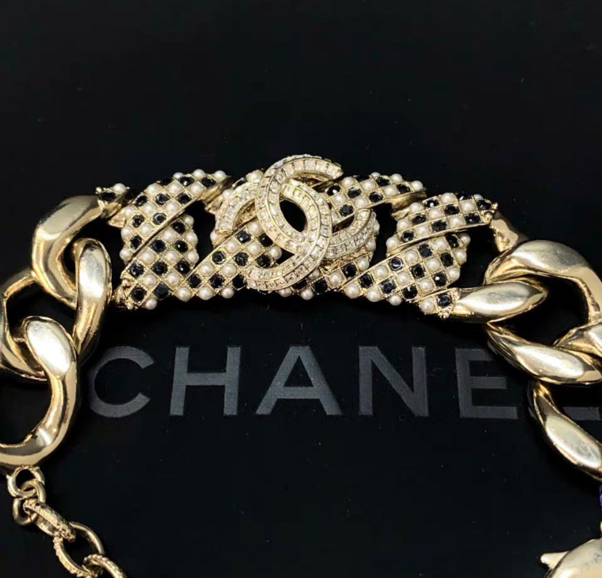 Chanel 21A rhinestone black and white pearl chain bracelet