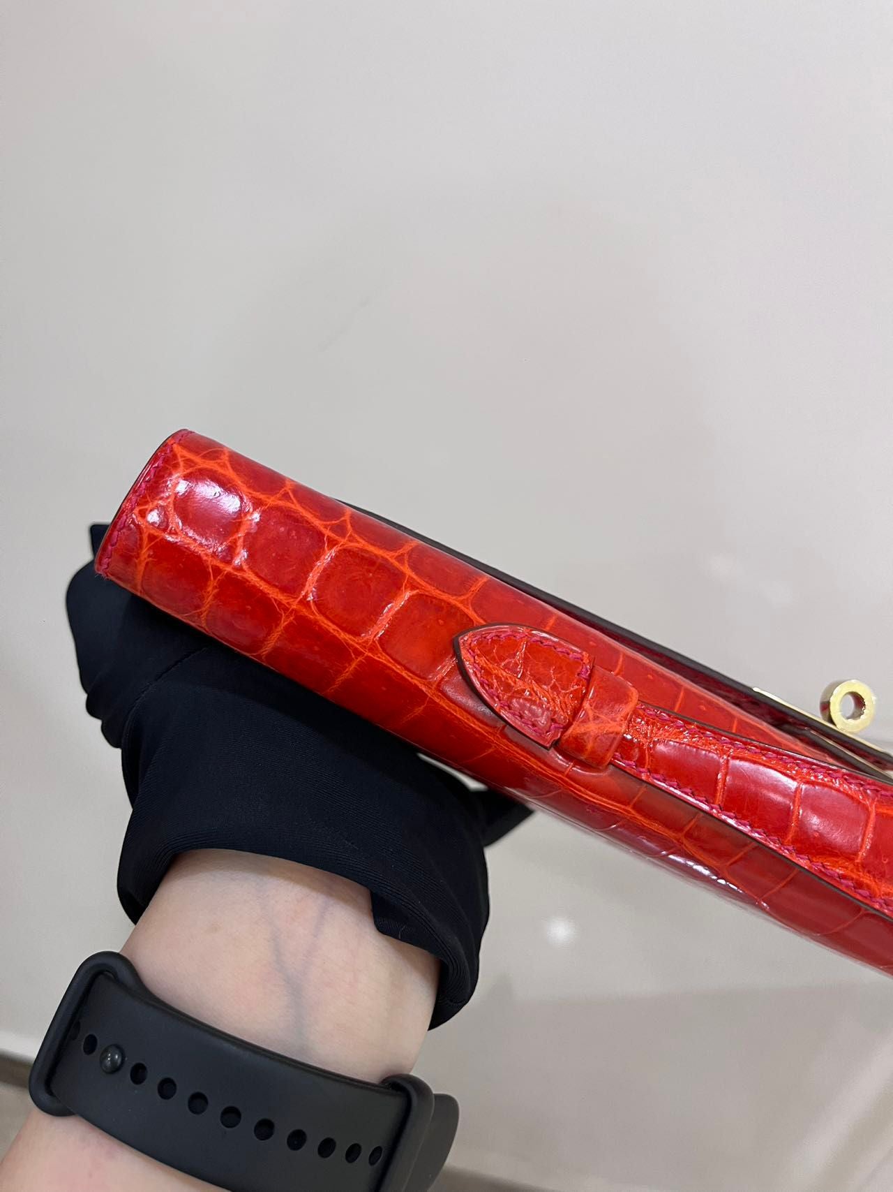 Hermes Kelly cut red shiny crocodile leather gold hardware