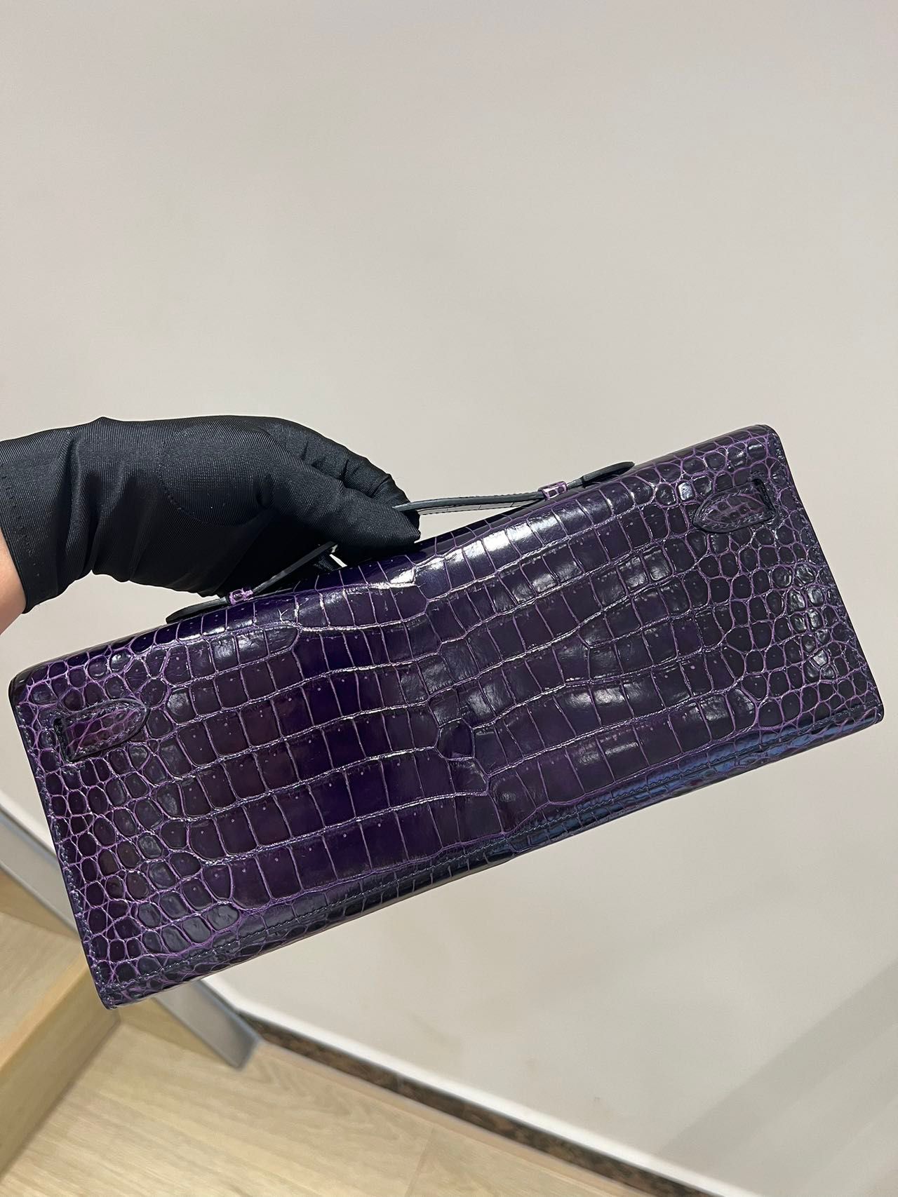 Hermes Kelly cut purple shiny crocodile leather gold hardware