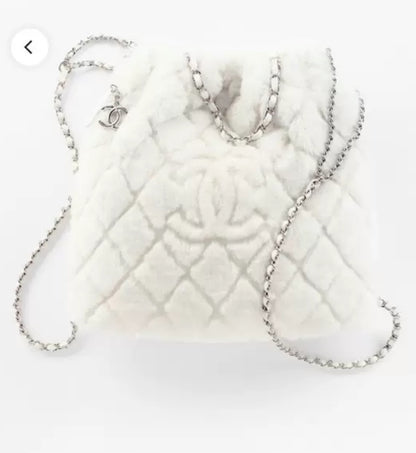 Chanel 22N white fur backpack