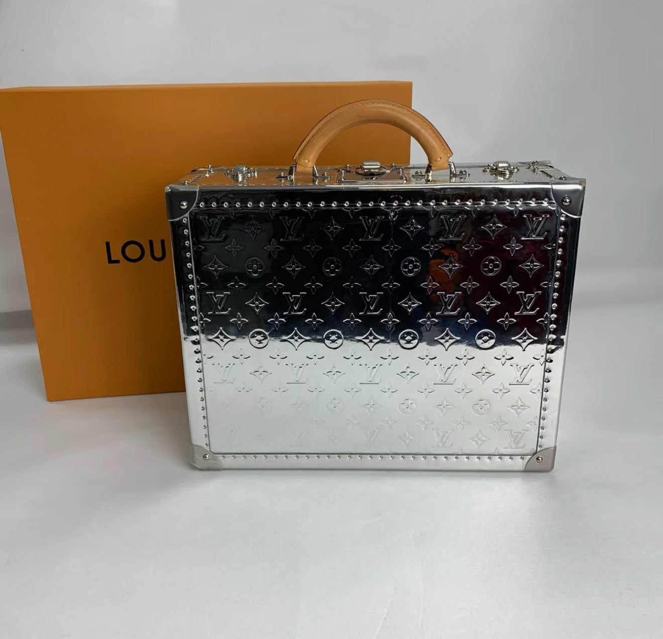 LOUIS VUITTON Silver Mirror Monogram Vinyl & Vachetta Leather Cotteville 40